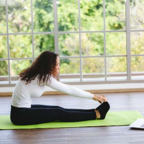 African American woman person exercise with Yoga at home, sport healthy lifestyle at indoor fitness