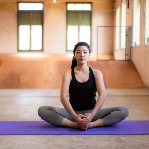 sport healthy young woman workout with yoga to exercise in fitness, gym training lifestyle concept